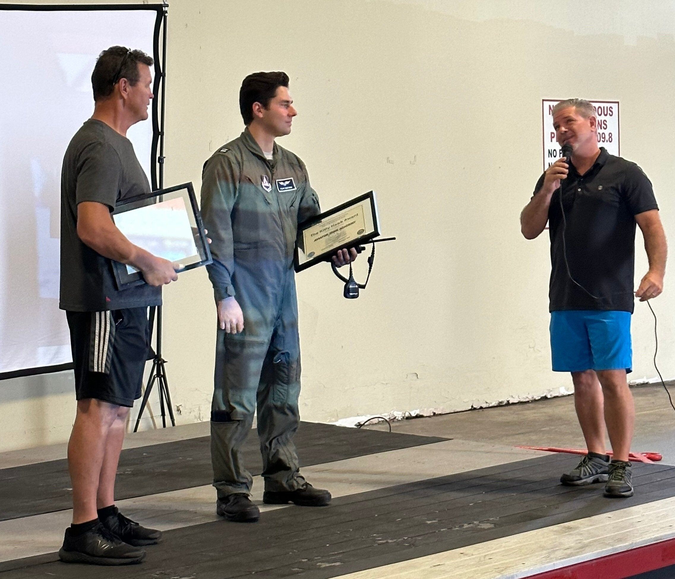Captain Felipe Santiago receiving the Kitty Hawk award