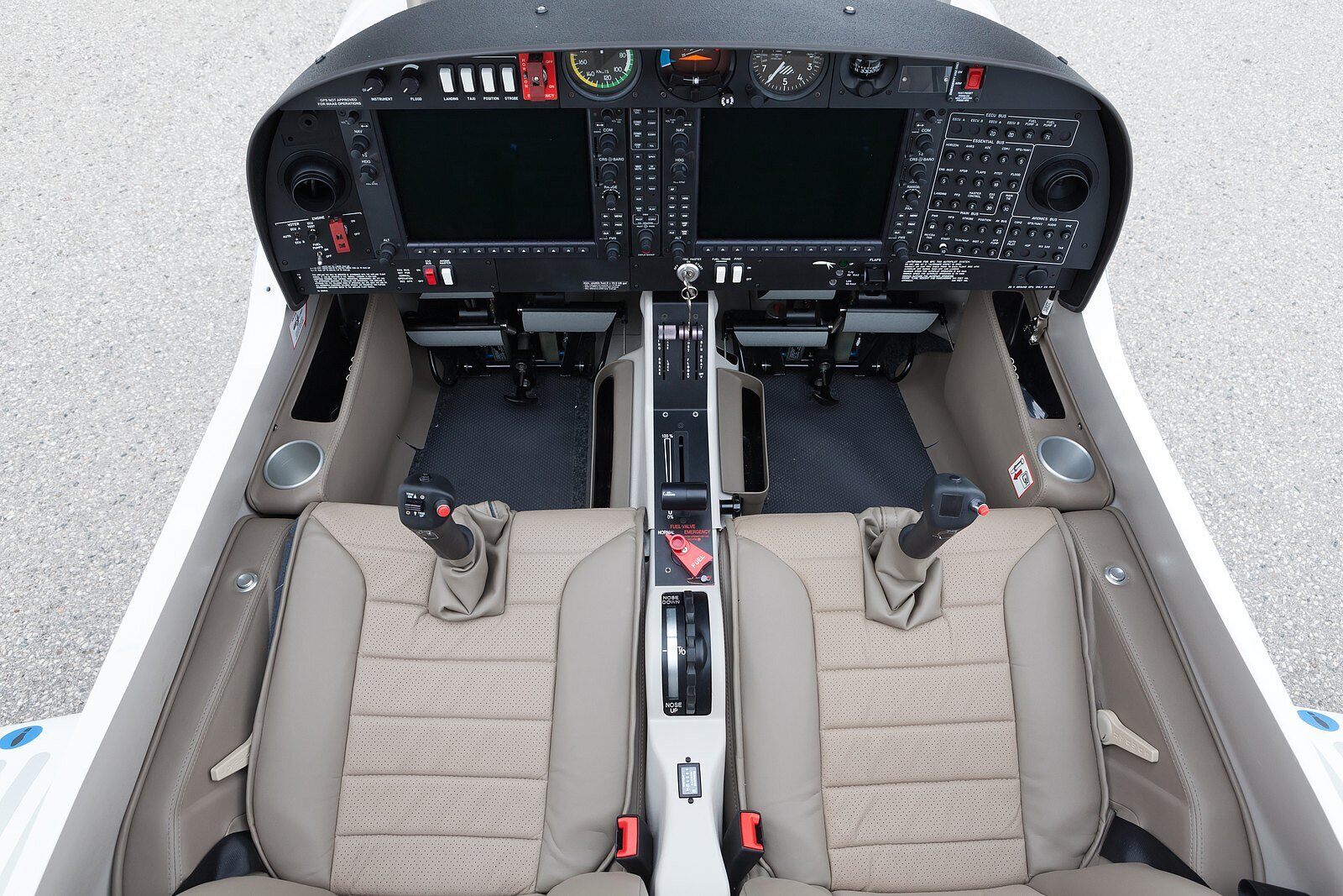 A wide angle photo showing the cockpit of a diamond aircraft