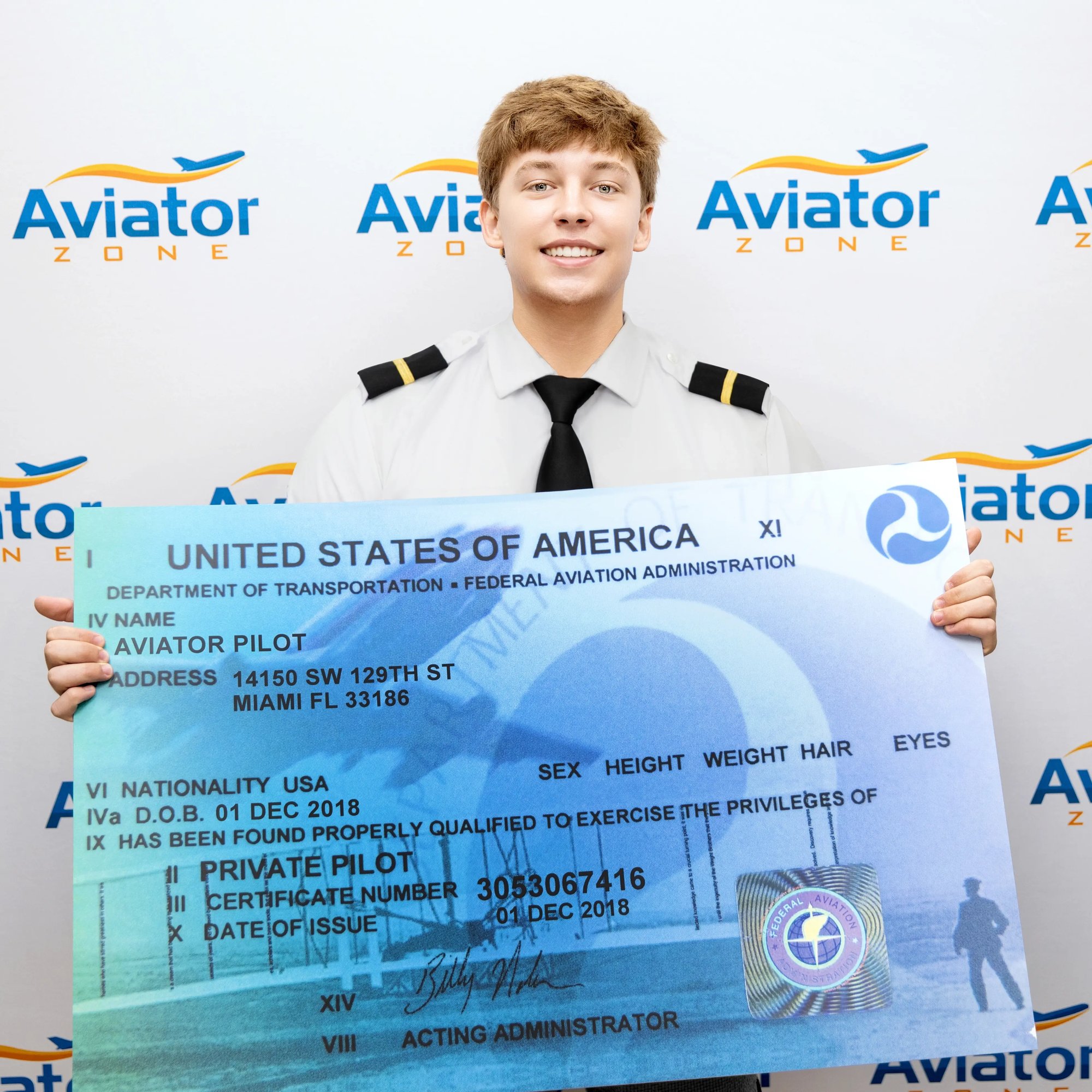 Student Showing Private Pilot Certificate-1